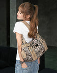 Bolso de hombro con estampado de leopardo de gran capacidad para mujer, moderno y versátil.