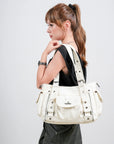 Textured Multi-Pocket Shoulder Bag with Rivet Details