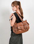 Textured Multi-Pocket Shoulder Bag with Rivet Details
