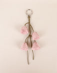 Vintage-Inspired Garden Bag Charm with Cascading Flowers