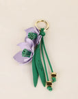 Vintage-Inspired Garden Bag Charm with Cascading Flowers